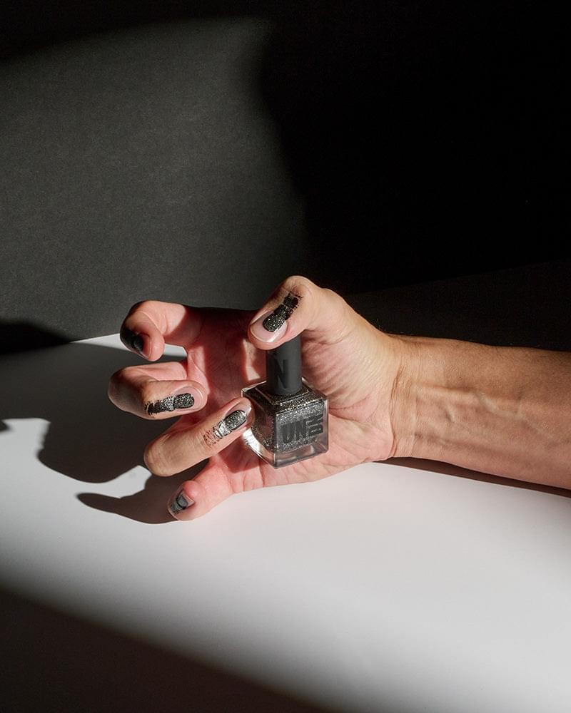 black glitter vegan nail polish